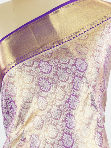 Kanchipuram Silk Beautiful bridal Kanjivaram Tissue saree featuring a luminous Lavender body, gracefully complemented by a matching Lavender border and elegant pallu. The delicate tissue weave adds a radiant shimmer, enhancing the saree’s luxurious and ethereal appeal. Expertly crafted with timeless Kanjivaram artistry, this drape exudes sophistication, grace, and bridal elegance. Paired with a matching Tissue Lavender blouse, it is a perfect choice for weddings, receptions, and grand celebrations. Ishvika 