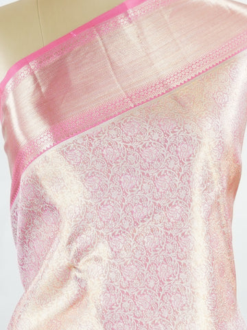 Kanchipuram Silk Beautiful bridal Kanjivaram saree featuring a delicate Pastel Pink body, elegantly paired with a matching border, pallu, and blouse. The soft pastel hue radiates grace and romance, creating a timeless and sophisticated bridal look. Exquisitely woven with traditional Kanjivaram craftsmanship, the saree blends heritage charm with modern elegance. A stunning choice for weddings and special celebrations, this enchanting drape embodies beauty, refinement, and bridal splendor. Darsitha - Pure Kan