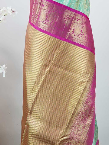 Kanchipuram Silk Handwoven to perfection, this 100% Pure Silk  saree in Red with Red detailing is a tribute to India’s rich weaving traditions. Ideal for weddings and grand occasions. Paraj - Red Pure Kanjivaram Silk Saree | Pure Zari - Manoranjitham Weaves - Handloom Store