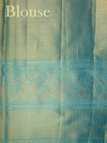 Kanchipuram Silk A delightful pink silk saree adorned with gold and silver zari buttas, paired with a striking cyan border. This saree celebrates the harmony of vibrant hues and intricate handloom artistry — perfect for weddings and timeless celebrations.             #ManoranjithamSilks #KanjivaramHandloom #PureSilkSaree #BridalElegance #TimelessTradition Atana - Pink Pure Kanjivaram Silk Saree | Zari Buttas - Manoranjitham Weaves - Handloom Store