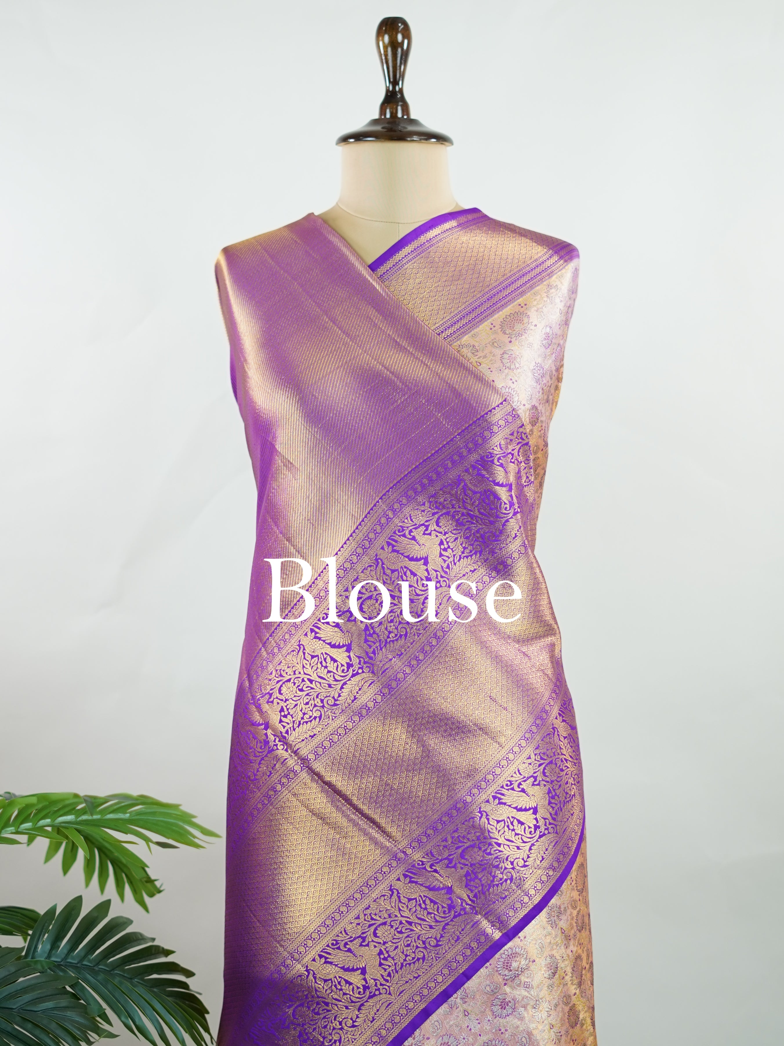 Kanchipuram Silk Soft peach silk meets purple borders, woven with gold and silver zari buttas that shimmer in every glance. This saree blends grace with tradition, perfect for festive moments. Crafted from 100% pure silk, it carries the artistry of timeless handlooms. A drape to cherish forever.                #ManoranjithamSilks #KanjivaramHandloom #PureSilkSaree #BridalElegance #TimelessTradition Sindhu - Peach Pure Kanjivaram Silk Saree | Zari Buttas - Manoranjitham Weaves - Handloom Store