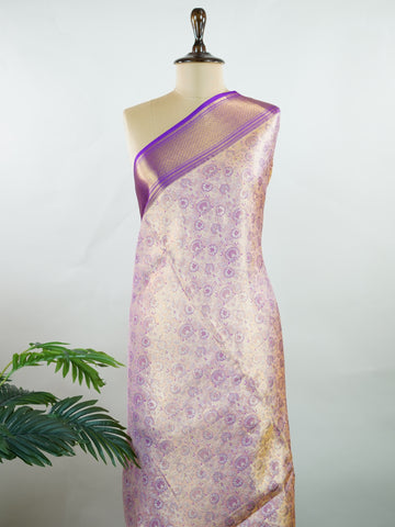 Kanchipuram Silk Soft peach silk meets purple borders, woven with gold and silver zari buttas that shimmer in every glance. This saree blends grace with tradition, perfect for festive moments. Crafted from 100% pure silk, it carries the artistry of timeless handlooms. A drape to cherish forever.                #ManoranjithamSilks #KanjivaramHandloom #PureSilkSaree #BridalElegance #TimelessTradition Sindhu - Peach Pure Kanjivaram Silk Saree | Zari Buttas - Manoranjitham Weaves - Handloom Store
