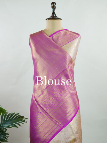 Kanchipuram Silk A subtle mauve silk saree with pink borders, woven with gold and silver zari buttas that shimmer in every fold. The soft hues bring elegance to timeless tradition. Handwoven in Kanchipuram with 100% pure silk, it's perfect for weddings and festive celebrations. A drape that carries beauty across generations.             #ManoranjithamSilks #KanjivaramHandloom #PureSilkSaree #BridalElegance #TimelessTradition Jayanthasri - Pure Kanjivaram Silk Saree | Zari Buttas - Manoranjitham Weaves - Han