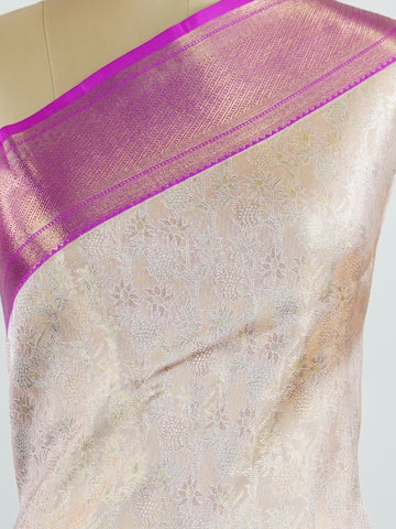Kanchipuram Silk A subtle mauve silk saree with pink borders, woven with gold and silver zari buttas that shimmer in every fold. The soft hues bring elegance to timeless tradition. Handwoven in Kanchipuram with 100% pure silk, it's perfect for weddings and festive celebrations. A drape that carries beauty across generations.             #ManoranjithamSilks #KanjivaramHandloom #PureSilkSaree #BridalElegance #TimelessTradition Jayanthasri - Pure Kanjivaram Silk Saree | Zari Buttas - Manoranjitham Weaves - Han