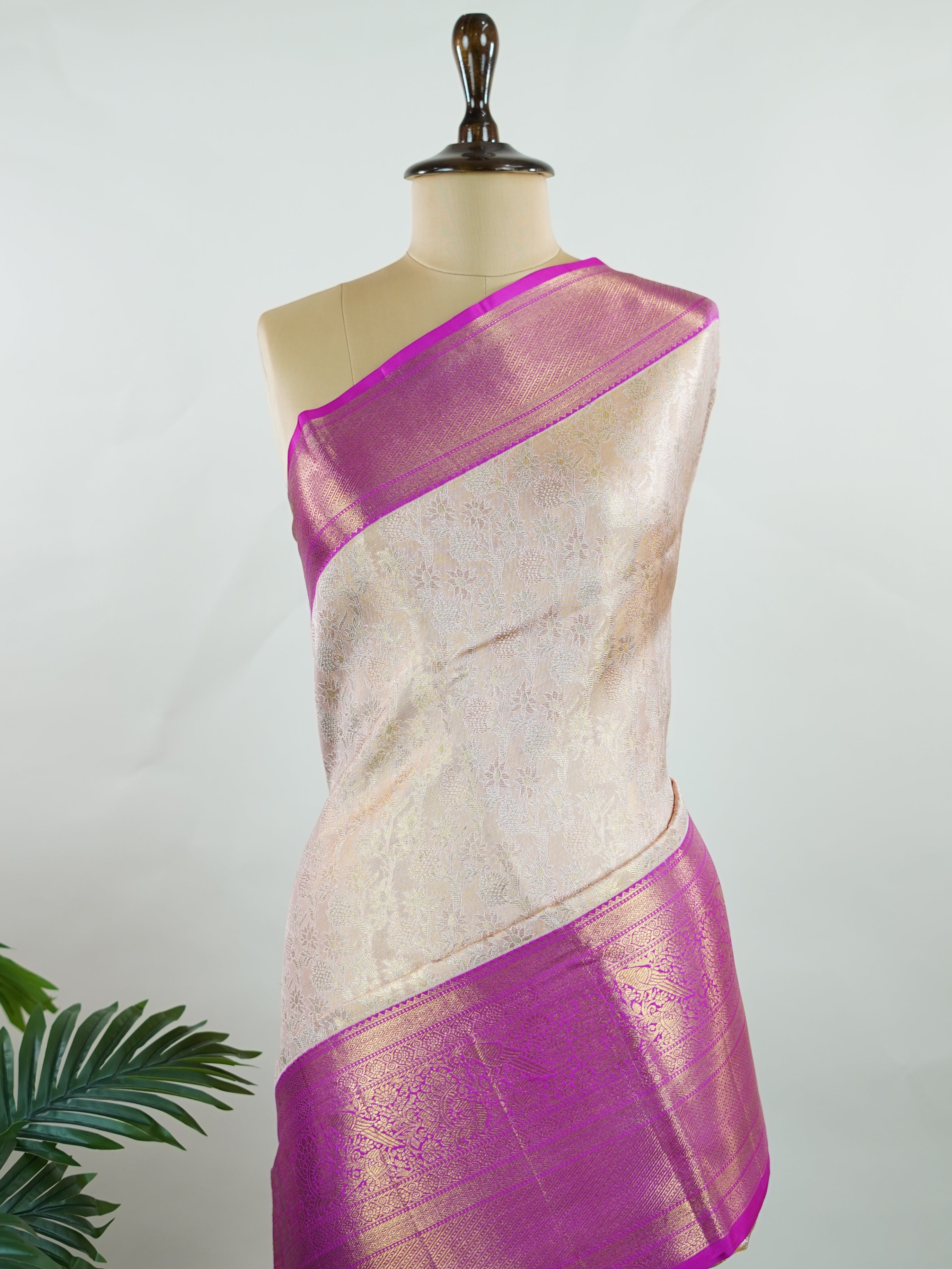 Kanchipuram Silk A subtle mauve silk saree with pink borders, woven with gold and silver zari buttas that shimmer in every fold. The soft hues bring elegance to timeless tradition. Handwoven in Kanchipuram with 100% pure silk, it's perfect for weddings and festive celebrations. A drape that carries beauty across generations.             #ManoranjithamSilks #KanjivaramHandloom #PureSilkSaree #BridalElegance #TimelessTradition Jayanthasri - Pure Kanjivaram Silk Saree | Zari Buttas - Manoranjitham Weaves - Han