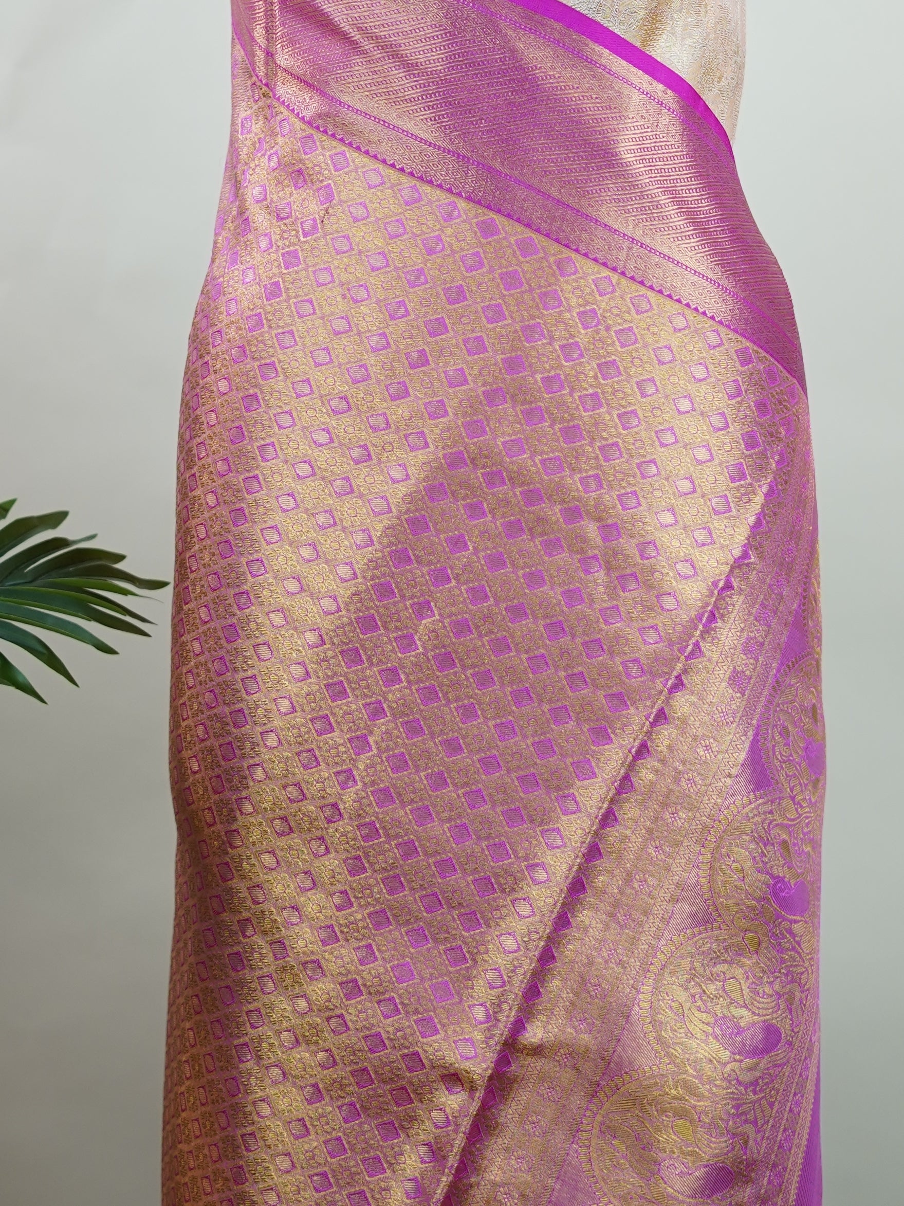 Kanchipuram Silk A subtle mauve silk saree with pink borders, woven with gold and silver zari buttas that shimmer in every fold. The soft hues bring elegance to timeless tradition. Handwoven in Kanchipuram with 100% pure silk, it's perfect for weddings and festive celebrations. A drape that carries beauty across generations.             #ManoranjithamSilks #KanjivaramHandloom #PureSilkSaree #BridalElegance #TimelessTradition Jayanthasri - Pure Kanjivaram Silk Saree | Zari Buttas - Manoranjitham Weaves - Han