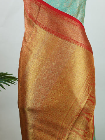 Kanchipuram Silk A rich green silk saree with bold red borders, adorned with gold and silver zari buttas that glimmer across the weave. The classic contrast reflects timeless tradition. Woven in Kanchipuram with 100% pure silk, it's perfect for weddings and special occasions. A drape that embodies heritage and grace.          #ManoranjithamSilks #KanjivaramHandloom #PureSilkSaree #BridalElegance #TimelessTradition Gowla - Green Pure Kanjivaram Silk Saree | Zari Buttas - Manoranjitham Weaves - Handloom Store