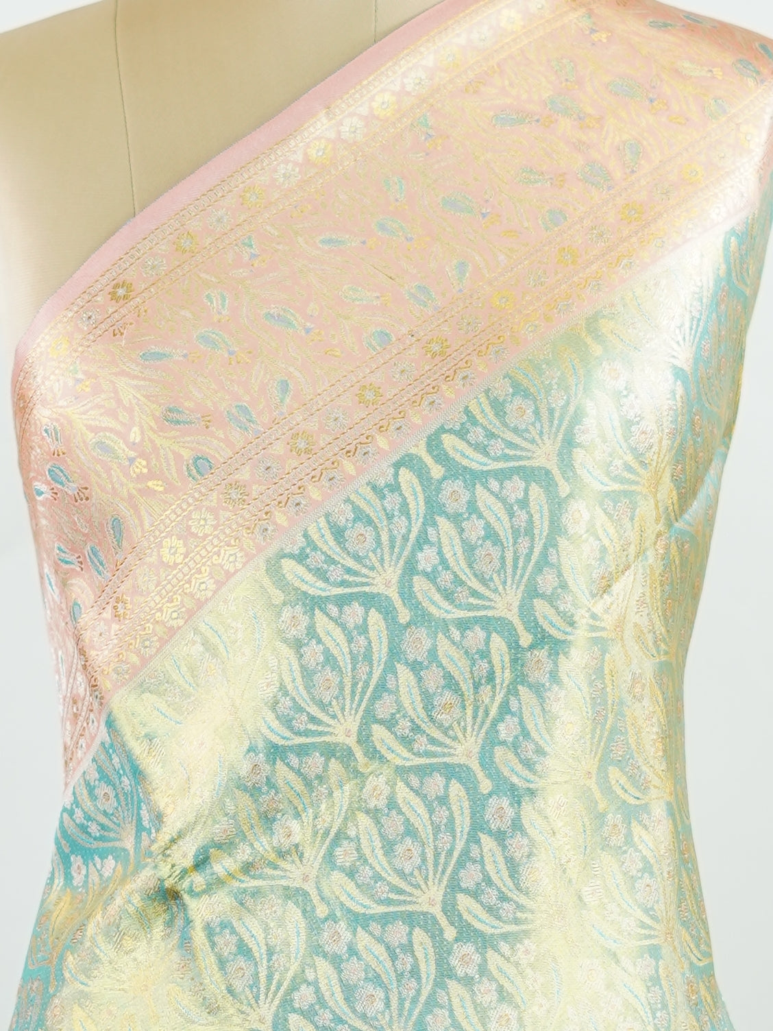 Kanchipuram Silk A refreshing green silk saree with light orange borders, adorned with gold and silver zari buttas that shimmer in gentle elegance. The vibrant contrast blends festive beauty with timeless tradition. Handwoven in Kanchipuram with 100% pure silk, it's perfect for weddings and special occasions. A drape that carries grace across generations.                #ManoranjithamSilks #KanjivaramHandloom #PureSilkSaree #BridalElegance #TimelessTradition Niroshtaa - Green Pure Kanjivaram Silk Saree | Za