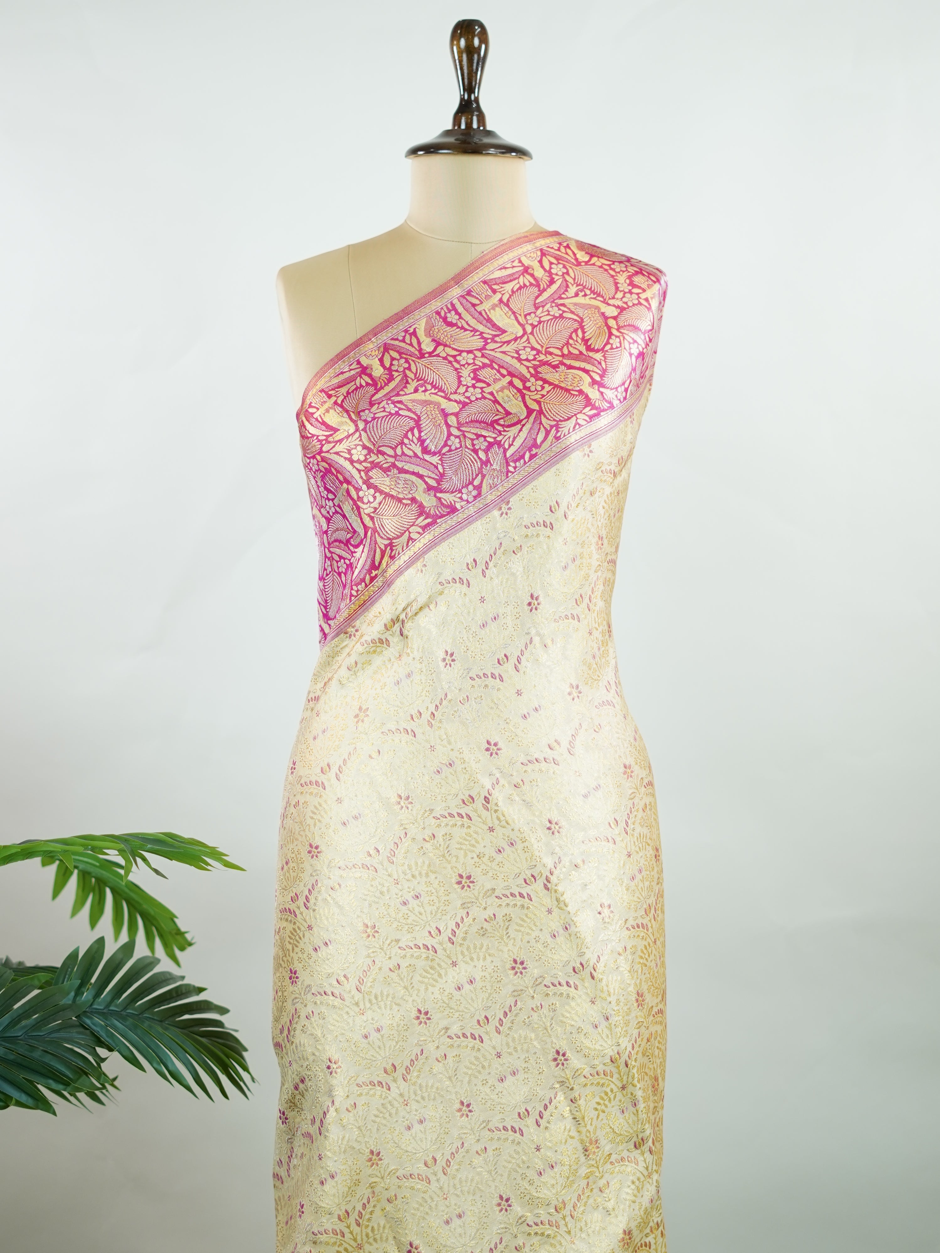 Kanchipuram Silk A classic cream silk saree with vibrant red borders, adorned with gold zari buttas that shimmer across the weave. The timeless contrast blends grace with festive splendour. Handwoven in Kanchipuram with 100% pure silk, it's perfect for weddings and special occasions. A drape that celebrates beauty and tradition.                    #ManoranjithamSilks #KanjivaramHandloom #PureSilkSaree #BridalElegance #TimelessTradition Rasikapriya - Cream Pure Kanjivaram Silk Saree | Zari Buttas - Manoranji