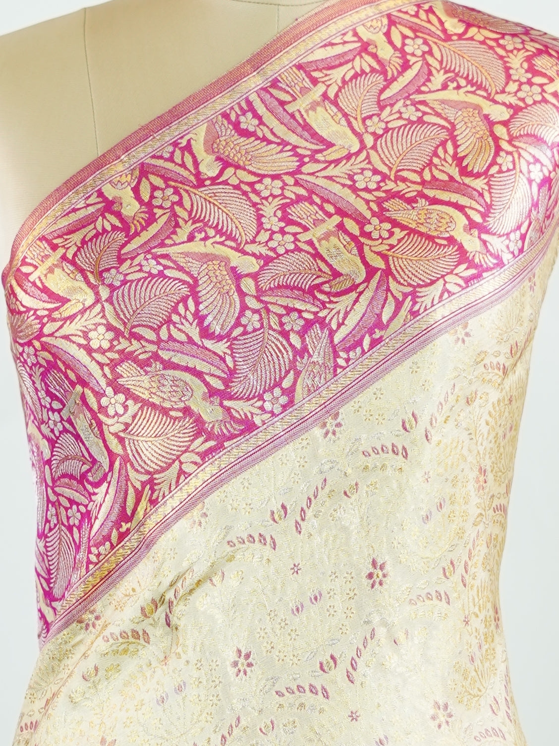 Kanchipuram Silk A classic cream silk saree with vibrant red borders, adorned with gold zari buttas that shimmer across the weave. The timeless contrast blends grace with festive splendour. Handwoven in Kanchipuram with 100% pure silk, it's perfect for weddings and special occasions. A drape that celebrates beauty and tradition.                    #ManoranjithamSilks #KanjivaramHandloom #PureSilkSaree #BridalElegance #TimelessTradition Rasikapriya - Cream Pure Kanjivaram Silk Saree | Zari Buttas - Manoranji