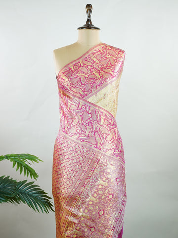 Kanchipuram Silk A classic cream silk saree with vibrant red borders, adorned with gold zari buttas that shimmer across the weave. The timeless contrast blends grace with festive splendour. Handwoven in Kanchipuram with 100% pure silk, it's perfect for weddings and special occasions. A drape that celebrates beauty and tradition.                    #ManoranjithamSilks #KanjivaramHandloom #PureSilkSaree #BridalElegance #TimelessTradition Rasikapriya - Cream Pure Kanjivaram Silk Saree | Zari Buttas - Manoranji