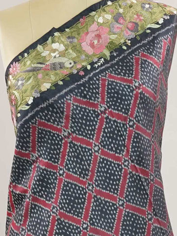 Pochampally Pochampally silks carry vibrant ikkat patterns, now graced with hand-embroidered Parsi Gara.br
A rare fusion of tradition and timeless elegance. Vaarahi - Handwork Embroidered Silk Saree | Ikkat Border - Manoranjitham Weaves - Handloom Store
