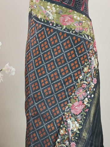 Pochampally Pochampally silks carry vibrant ikkat patterns, now graced with hand-embroidered Parsi Gara.br
A rare fusion of tradition and timeless elegance. Vaarahi - Handwork Embroidered Silk Saree | Ikkat Border - Manoranjitham Weaves - Handloom Store