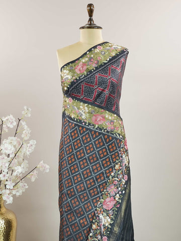 Pochampally Pochampally silks carry vibrant ikkat patterns, now graced with hand-embroidered Parsi Gara.br
A rare fusion of tradition and timeless elegance. Vaarahi - Handwork Embroidered Silk Saree | Ikkat Border - Manoranjitham Weaves - Handloom Store