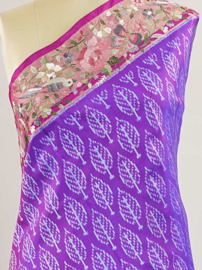 Pochampally Pochampally silks carry vibrant ikkat patterns, now graced with hand-embroidered Parsi Gara.br
A rare fusion of tradition and timeless elegance. Tripura Sundari - Handwork Embroidered Silk Saree | Ikkat Border - Manoranjitham Weaves - Handloom Store