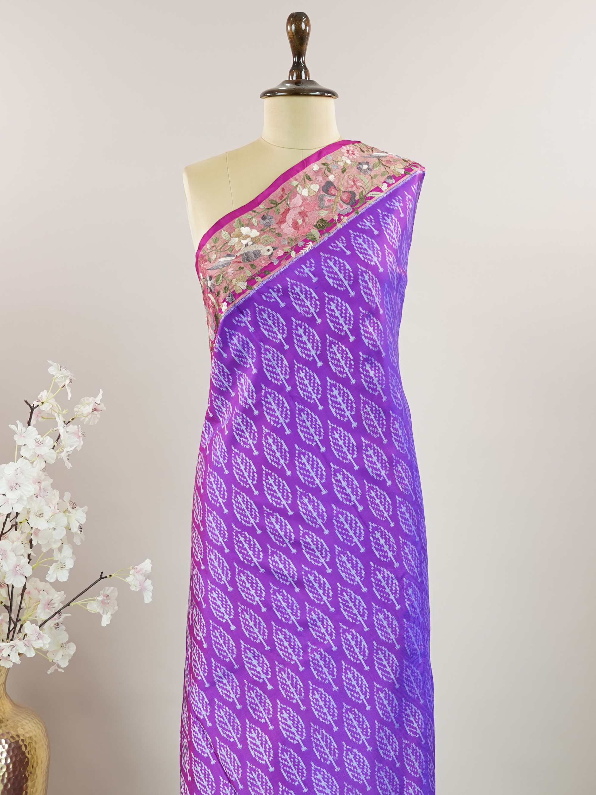 Pochampally Pochampally silks carry vibrant ikkat patterns, now graced with hand-embroidered Parsi Gara.br
A rare fusion of tradition and timeless elegance. Tripura Sundari - Handwork Embroidered Silk Saree | Ikkat Border - Manoranjitham Weaves - Handloom Store