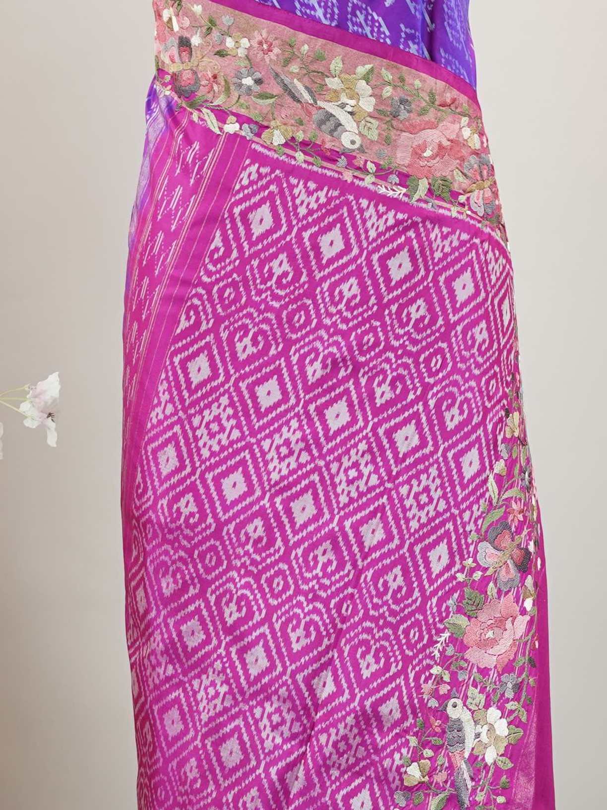Pochampally Pochampally silks carry vibrant ikkat patterns, now graced with hand-embroidered Parsi Gara.br
A rare fusion of tradition and timeless elegance. Tripura Sundari - Handwork Embroidered Silk Saree | Ikkat Border - Manoranjitham Weaves - Handloom Store