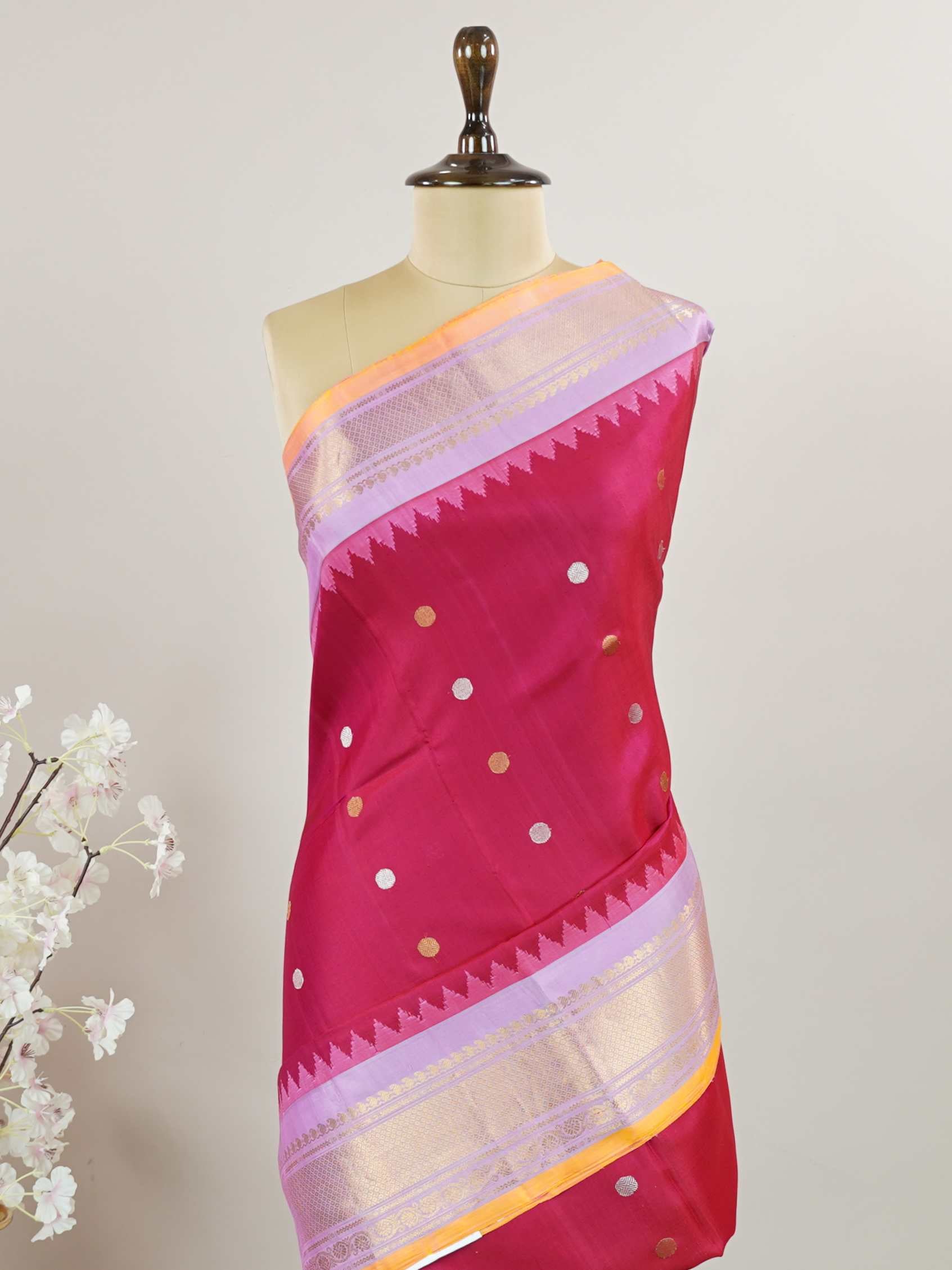 Gadwal Silk This pure handloom Gadwal saree is a testament to timeless tradition, crafted meticulously on looms by master weavers of Telangana. Its vibrant body and shimmering zari borders strike a perfect balance between grandeur and grace. Lightweight yet regal, it’s the ideal choice for weddings, temple visits, and family celebrations. A saree that carries heritage in every thread.

#Manoranjitham #GadwalSilk #HandloomSarees #TelanganaWeaves #HeirloomSilks #ZariElegance #BridalWeaves #TimelessTradition #