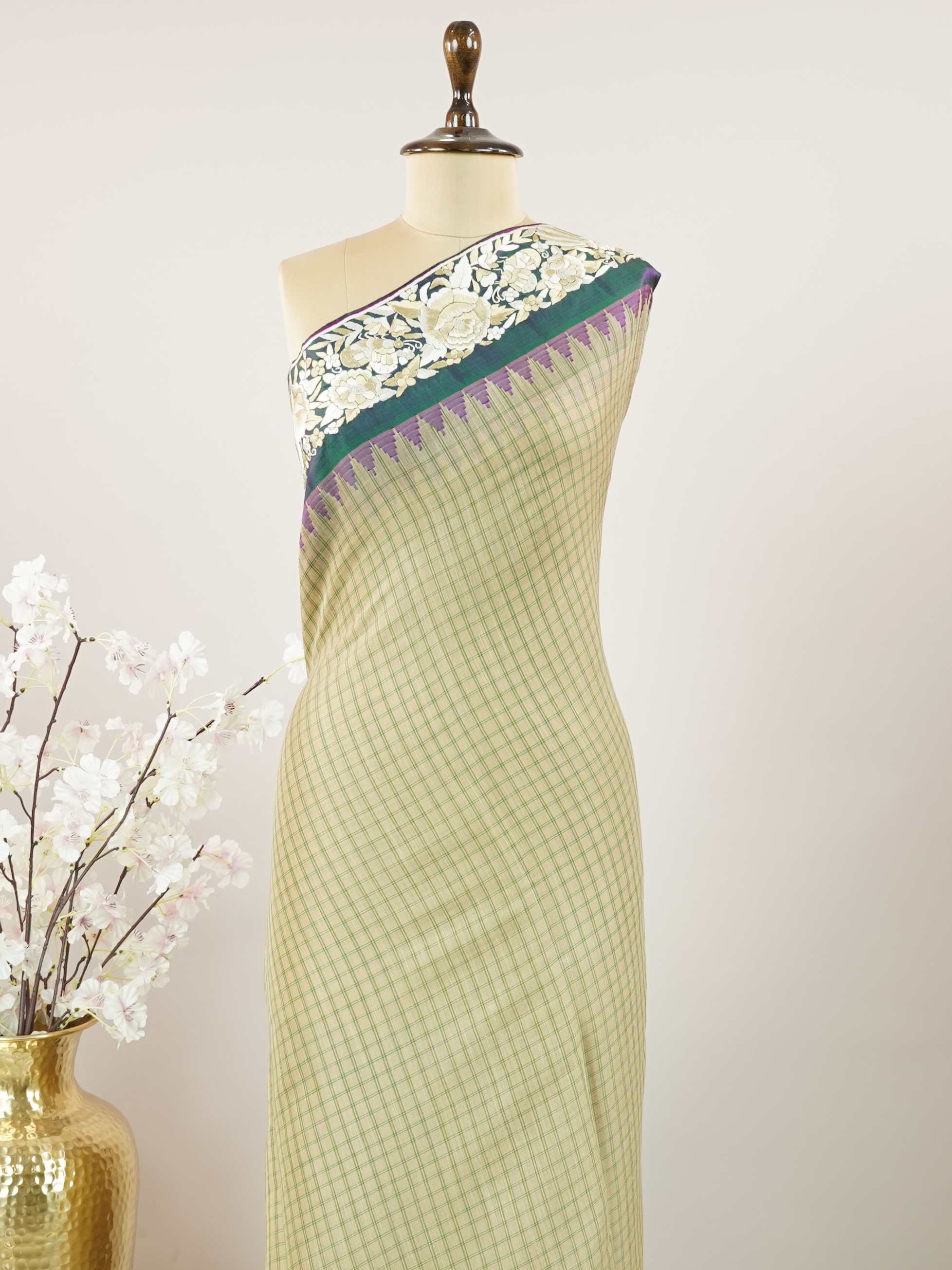 Gadwal Silk A luminous pure tissue saree, feather-light and festive, shimmering softly with every movement.br
The pallu and blouse are brought to life with intricate Katha embroidery—each motif a tale in thread.br
Graceful and artistic, it’s perfect for intimate weddings, receptions, or meaningful celebrations.br
A drape that glows with elegance and whispers stories through its stitches.br
#Manoranjitham #PureTissueSaree #KathaEmbroidery #HandcraftedElegance #ArtInThread #LightAsAir #FestiveWeaves Rupalatha