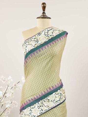 Gadwal Silk A luminous pure tissue saree, feather-light and festive, shimmering softly with every movement.br
The pallu and blouse are brought to life with intricate Katha embroidery—each motif a tale in thread.br
Graceful and artistic, it’s perfect for intimate weddings, receptions, or meaningful celebrations.br
A drape that glows with elegance and whispers stories through its stitches.br
#Manoranjitham #PureTissueSaree #KathaEmbroidery #HandcraftedElegance #ArtInThread #LightAsAir #FestiveWeaves Rupalatha