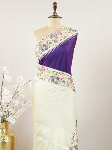 Gadwal Silk Royal blue silk adorned with pista green borders, brought alive with embroidery. The colours dance in harmony for vibrant occasions. Light on the body yet rich in appeal. A modern twist to heritage Gadwals. #RoyalBlueSilk #GadwalEmbroidery #NoZari #LightLuxury Amritavarshini - Royal Blue Handwork Embroidered Silk Saree | Parsigara Embroidery - Manoranjitham Weaves - Handloom Store