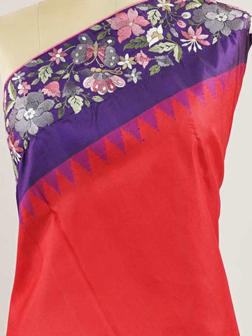 Gadwal Silk Bright red silk with deep blue borders, graced by fine embroidery. Striking contrast for weddings and special events. The soft silk moves effortlessly with every step. A saree that blends drama with tradition. #RedBlueSaree #GadwalSilk #NoZari #HeritageWeaves Hamsanandi - Bright Red Handwork Embroidered Silk Saree | Parsigara Embroidery - Manoranjitham Weaves - Handloom Store