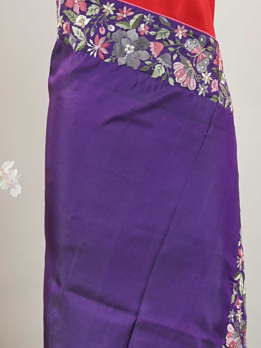 Gadwal Silk Bright red silk with deep blue borders, graced by fine embroidery. Striking contrast for weddings and special events. The soft silk moves effortlessly with every step. A saree that blends drama with tradition. #RedBlueSaree #GadwalSilk #NoZari #HeritageWeaves Hamsanandi - Bright Red Handwork Embroidered Silk Saree | Parsigara Embroidery - Manoranjitham Weaves - Handloom Store