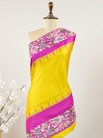 Gadwal Silk Bright red silk with deep blue borders, graced by fine embroidery. Striking contrast for weddings and special events. The soft silk moves effortlessly with every step. A saree that blends drama with tradition. #RedBlueSaree #GadwalSilk #NoZari #HeritageWeaves Hamsanandi - Bright Red Handwork Embroidered Silk Saree | Parsigara Embroidery - Manoranjitham Weaves - Handloom Store