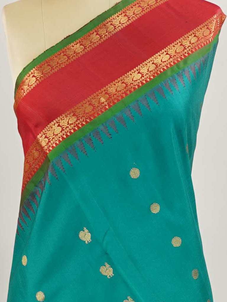 Gadwal Silk Gadwal handlooms are where simplicity meets regal artistry. Their contrast borders and rich pallus embody cultural pride. Charumati - Handloom Gadwal Silk Saree | Pure Silk | Zari Border - Manoranjitham Weaves - Handloom Store