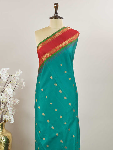 Gadwal Silk Gadwal handlooms are where simplicity meets regal artistry. Their contrast borders and rich pallus embody cultural pride. Charumati - Handloom Gadwal Silk Saree | Pure Silk | Zari Border - Manoranjitham Weaves - Handloom Store