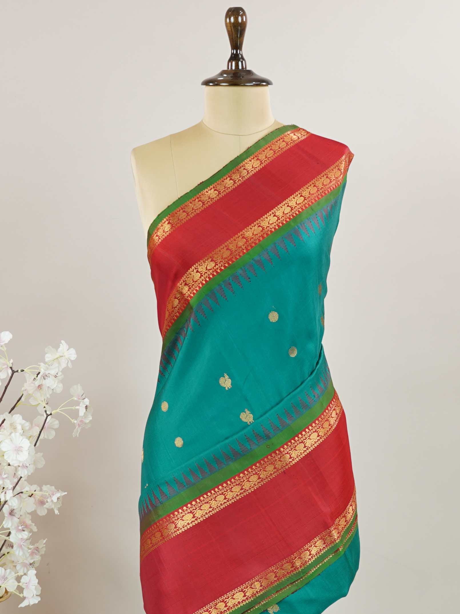 Gadwal Silk Gadwal handlooms are where simplicity meets regal artistry. Their contrast borders and rich pallus embody cultural pride. Charumati - Handloom Gadwal Silk Saree | Pure Silk | Zari Border - Manoranjitham Weaves - Handloom Store