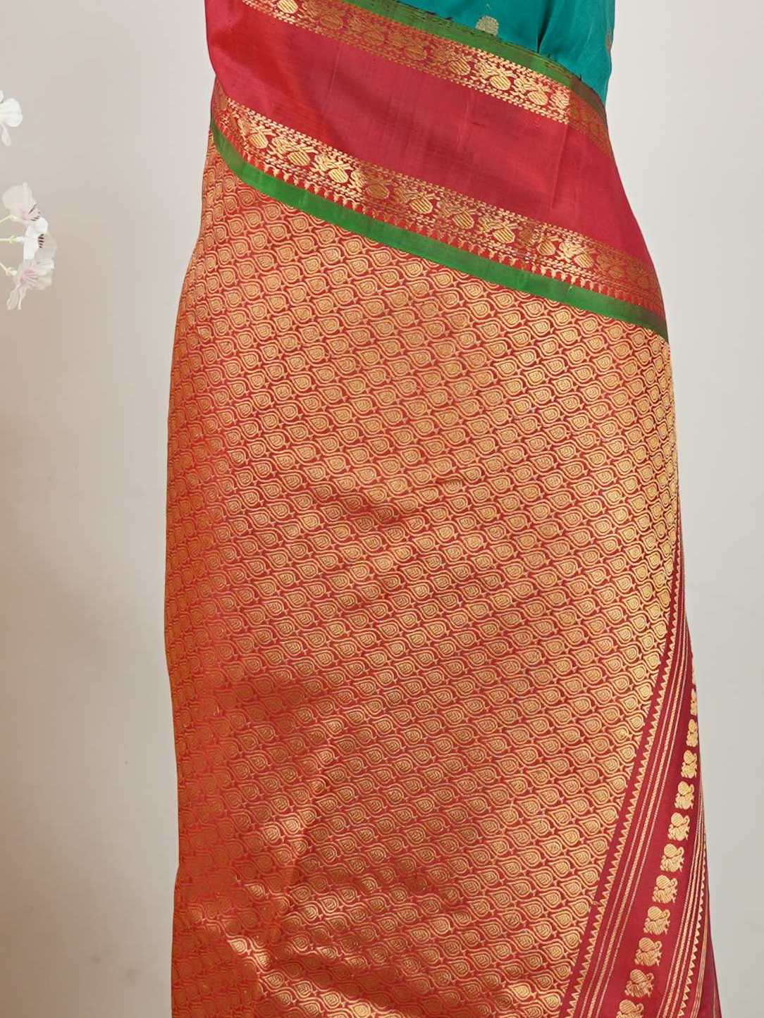 Gadwal Silk Gadwal handlooms are where simplicity meets regal artistry. Their contrast borders and rich pallus embody cultural pride. Charumati - Handloom Gadwal Silk Saree | Pure Silk | Zari Border - Manoranjitham Weaves - Handloom Store