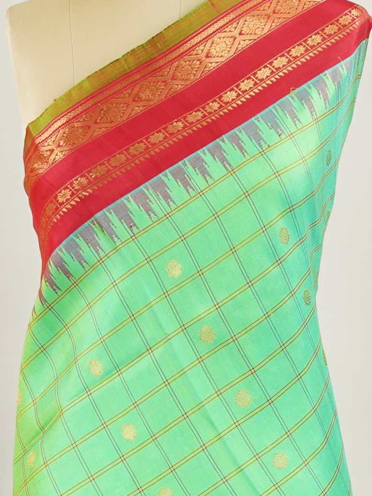 Gadwal Silk Gadwal handlooms are where simplicity meets regal artistry. Their contrast borders and rich pallus embody cultural pride. Lavanya - Gadwal saree - Manoranjitham Weaves - Handloom Store