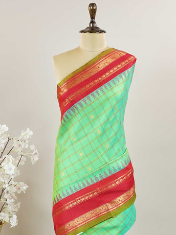 Gadwal Silk Gadwal handlooms are where simplicity meets regal artistry. Their contrast borders and rich pallus embody cultural pride. Lavanya - Gadwal saree - Manoranjitham Weaves - Handloom Store