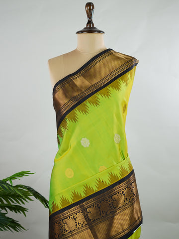 Gadwal Silk Handwoven in Telangana, Gadwal is a pure silk saree celebrated for its lightness, softness that deepens with every use, and its timeless elegance—making it one of the most comfortable and graceful vintage sarees ever woven Sharmila - Handloom Gadwal Silk Saree | Pure Silk | Zari Border - Manoranjitham Weaves - Handloom Store