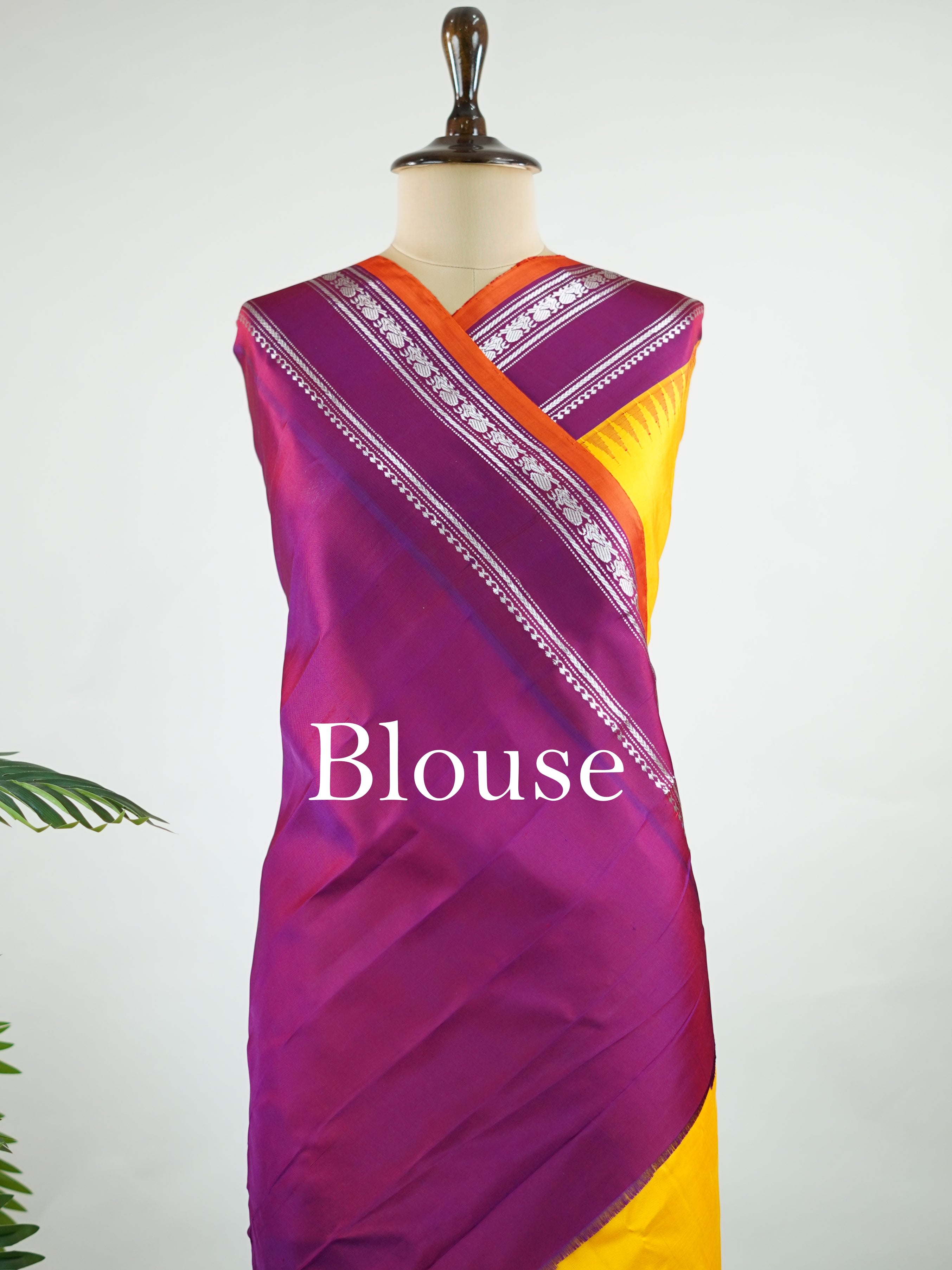 Gadwal Silk This vibrant Gadwal saree features a yellow body paired with a magenta pink border, crafted from 100% pure silk.br
The body is adorned with delicate resham checks, adding texture and understated elegance.br
Finished with a graceful gap border, it beautifully showcases the timeless handloom artistry of Gadwal weaving. Shankari - Yellow Handloom Gadwal Silk Saree | Pure Silk | Zari Border - Manoranjitham Weaves - Handloom Store