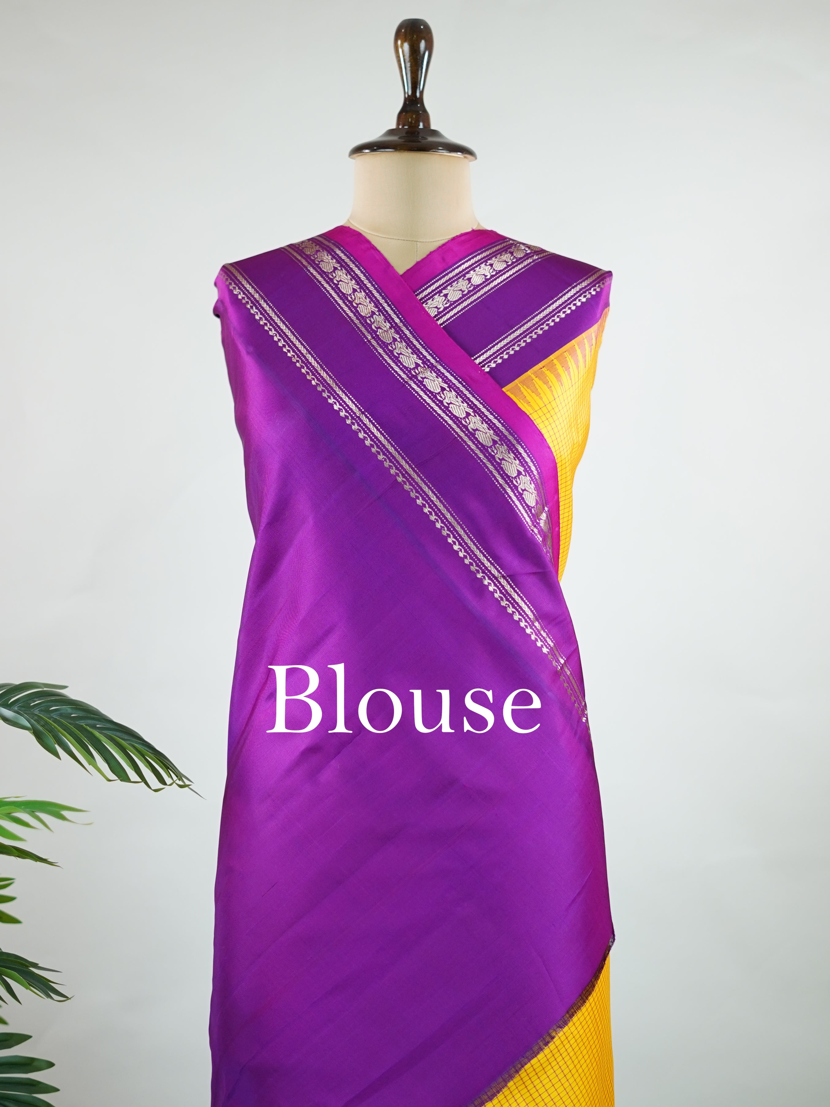 Gadwal Silk This elegant Gadwal saree features a yellow body paired with a magenta pink border, crafted from 100% pure silk.br
The plain body offers a clean, sophisticated look, perfect for any occasion.br
Finished with a graceful gap border, it highlights the timeless handloom craftsmanship of Gadwal weaving. Sreekari - Yellow Handloom Gadwal Silk Saree | Pure Silk | Zari Border - Manoranjitham Weaves - Handloom Store