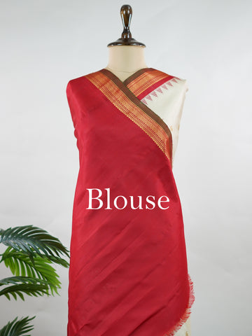 Gadwal Silk This elegant Gadwal saree features a beige body paired with a red border, crafted from 100% pure silk.br
The body is adorned with delicate gold mango and rudraksha buttis, adding a touch of traditional charm.br
Finished with a subtle small border, it showcases the exquisite handloom artistry of Gadwal weaving. Mangala - Beige Handloom Gadwal Silk Saree | Pure Silk | Zari Border - Manoranjitham Weaves - Handloom Store