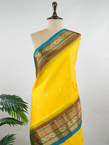 Punyangi – Yellow Handloom Gadwal Silk Saree | Pure Silk | Zari Border