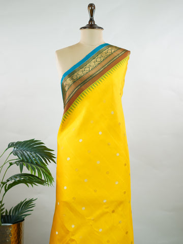 Punyangi – Yellow Handloom Gadwal Silk Saree | Pure Silk | Zari Border