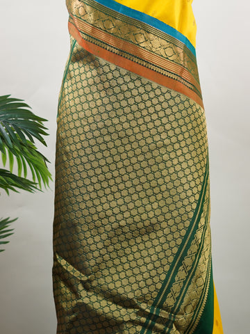 Punyangi – Yellow Handloom Gadwal Silk Saree | Pure Silk | Zari Border