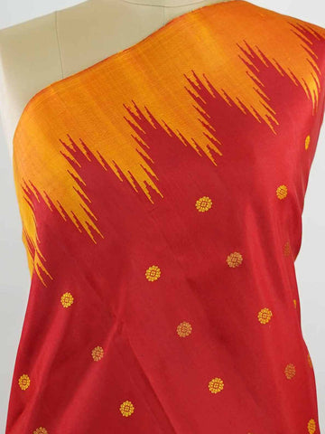Gadwal Silk This vibrant Gadwal saree features a red body paired with a mustard border, crafted from 100% pure silk.br
The body is adorned with delicate thread buttis, while the border showcases traditional temple kota kommas for a classic touch.br
Completed with a contrasting blouse, it highlights exquisite handloom craftsmanship and timeless elegance. Ekanta - Red Handloom Gadwal Silk Saree | Pure Silk | Zari Border - Manoranjitham Weaves - Handloom Store