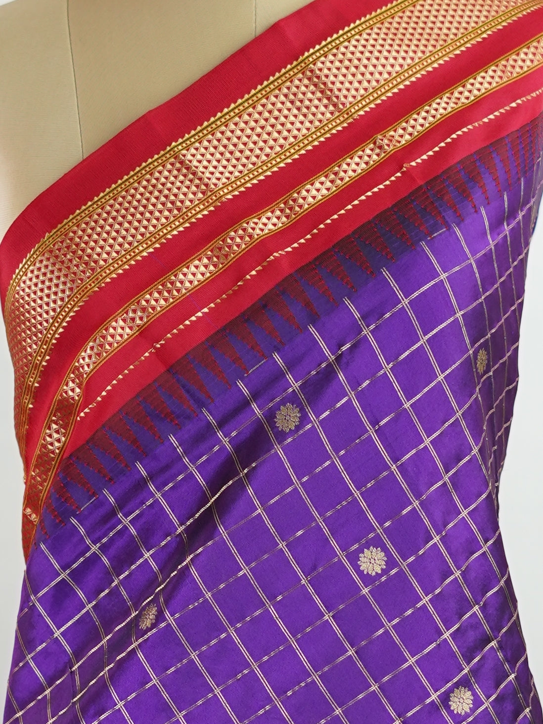 Narayanpet Narayanpet sarees with checks and buttis showcase a perfect blend of tradition and simplicity, featuring intricate motifs woven over classic check patterns.
Their vibrant colors and fine craftsmanship make them elegant choices for any occasion.
 Durga - Manoranjitham Weaves - Handloom Store