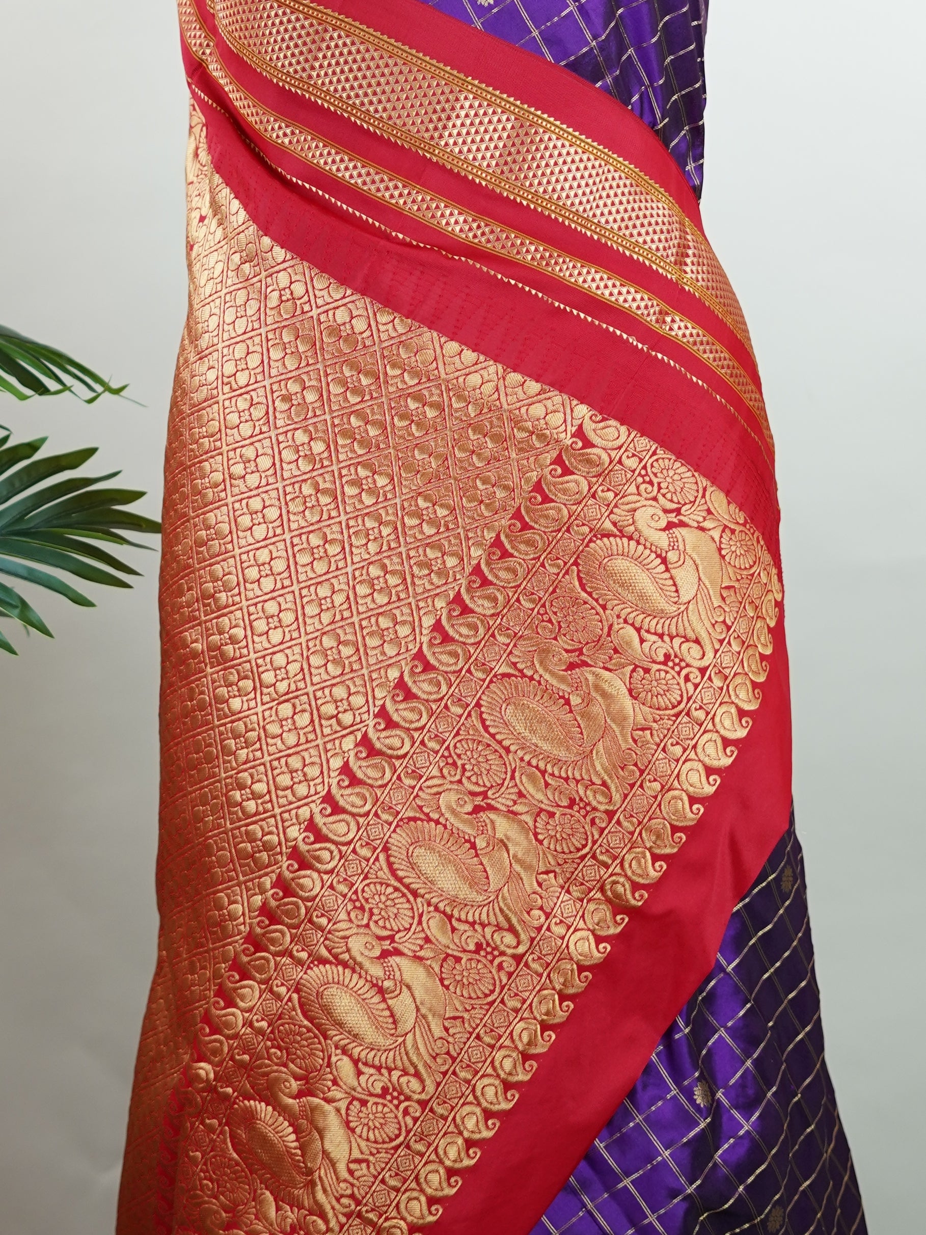 Narayanpet Narayanpet sarees with checks and buttis showcase a perfect blend of tradition and simplicity, featuring intricate motifs woven over classic check patterns.
Their vibrant colors and fine craftsmanship make them elegant choices for any occasion.
 Durga - Manoranjitham Weaves - Handloom Store