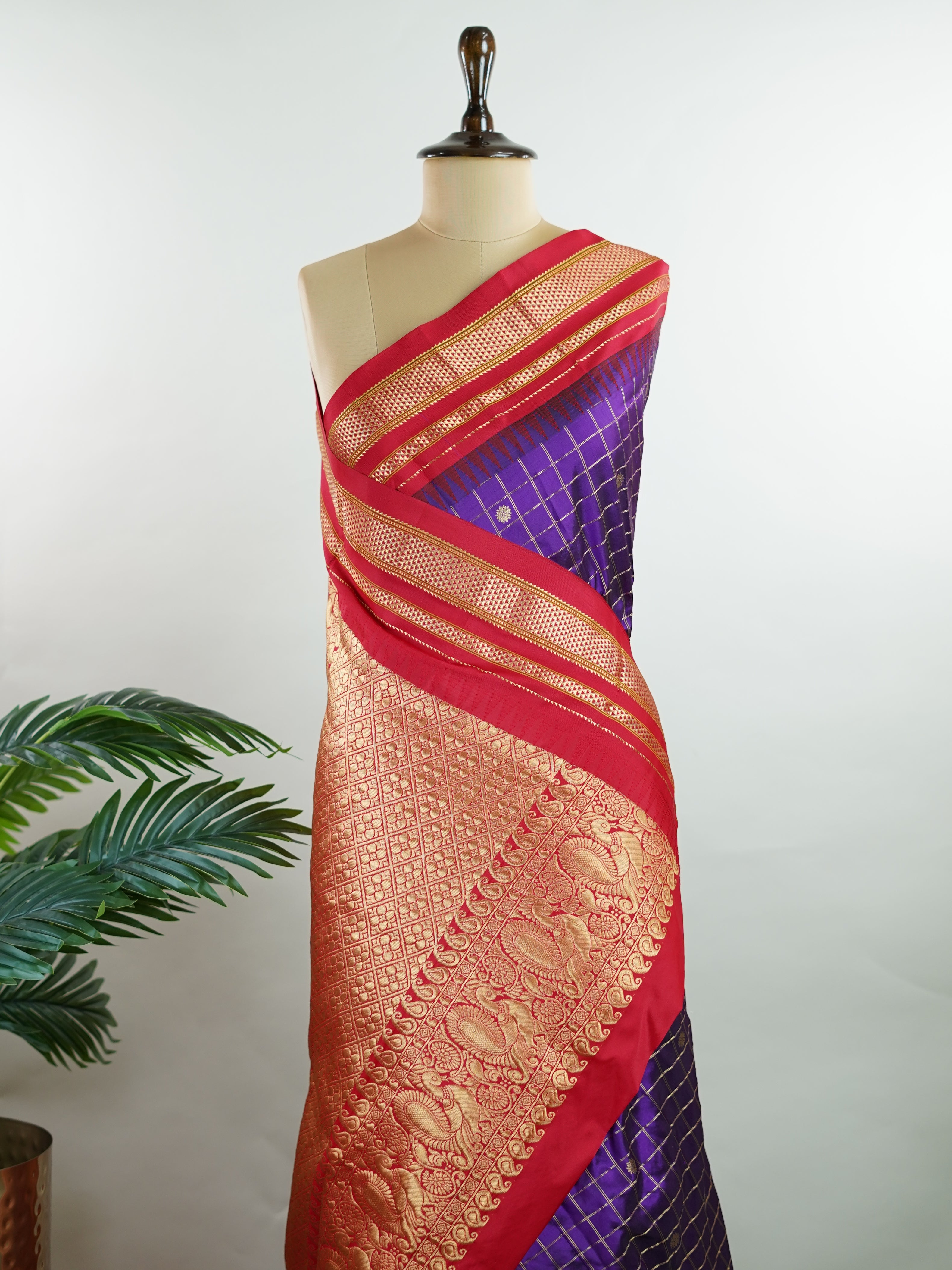 Narayanpet Narayanpet sarees with checks and buttis showcase a perfect blend of tradition and simplicity, featuring intricate motifs woven over classic check patterns.
Their vibrant colors and fine craftsmanship make them elegant choices for any occasion.
 Durga - Manoranjitham Weaves - Handloom Store