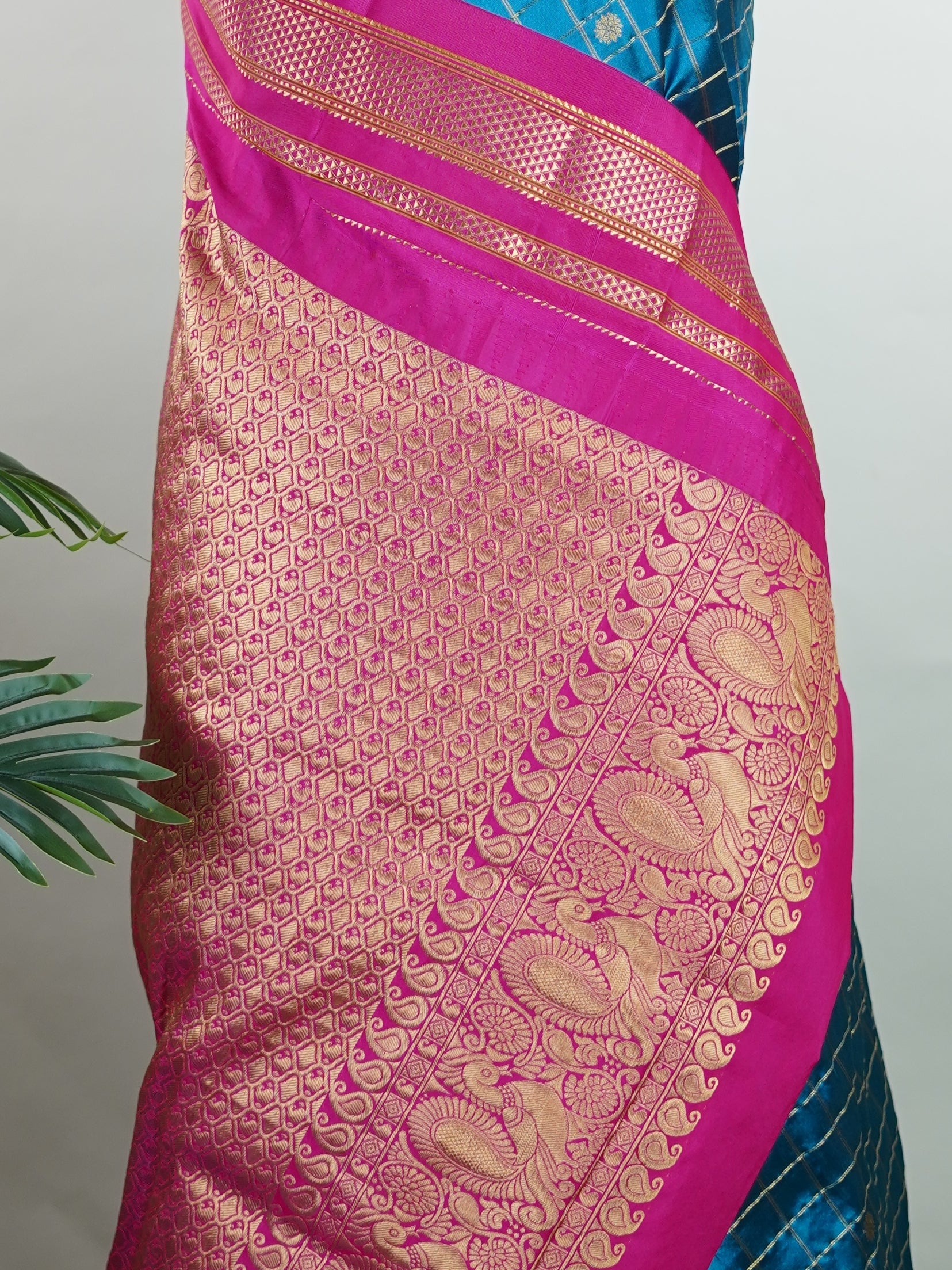 Narayanpet Narayanpet sarees with checks and buttis showcase a perfect blend of tradition and simplicity, featuring intricate motifs woven over classic check patterns.
Their vibrant colors and fine craftsmanship make them elegant choices for any occasion.
 Chandrika - Manoranjitham Weaves - Handloom Store