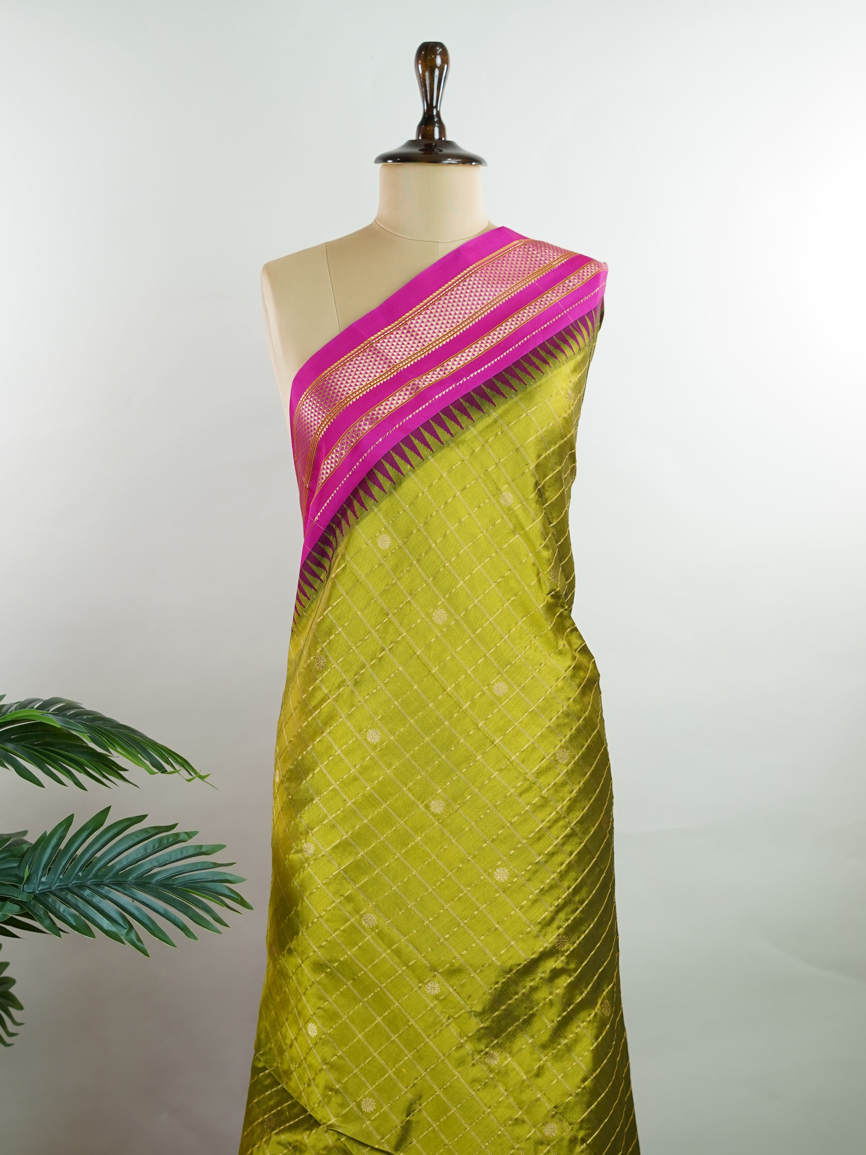 Narayanpet Narayanpet sarees with checks and buttis showcase a perfect blend of tradition and simplicity, featuring intricate motifs woven over classic check patterns.
Their vibrant colors and fine craftsmanship make them elegant choices for any occasion.
 Chandravadana - Manoranjitham Weaves - Handloom Store