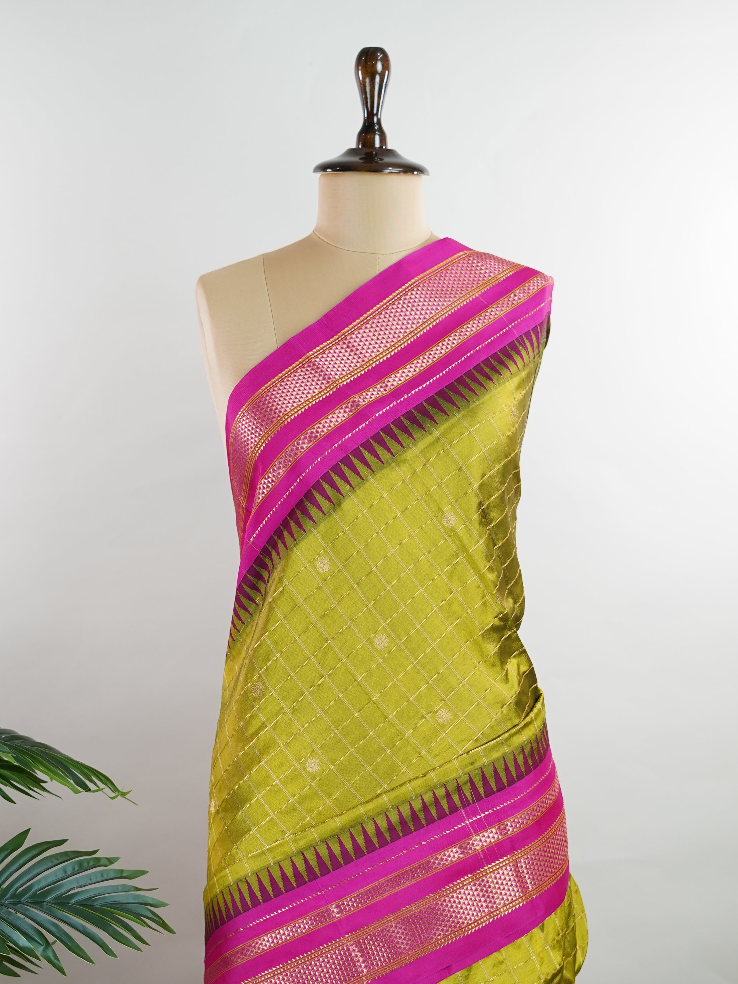 Narayanpet Narayanpet sarees with checks and buttis showcase a perfect blend of tradition and simplicity, featuring intricate motifs woven over classic check patterns.
Their vibrant colors and fine craftsmanship make them elegant choices for any occasion.
 Chandravadana - Manoranjitham Weaves - Handloom Store