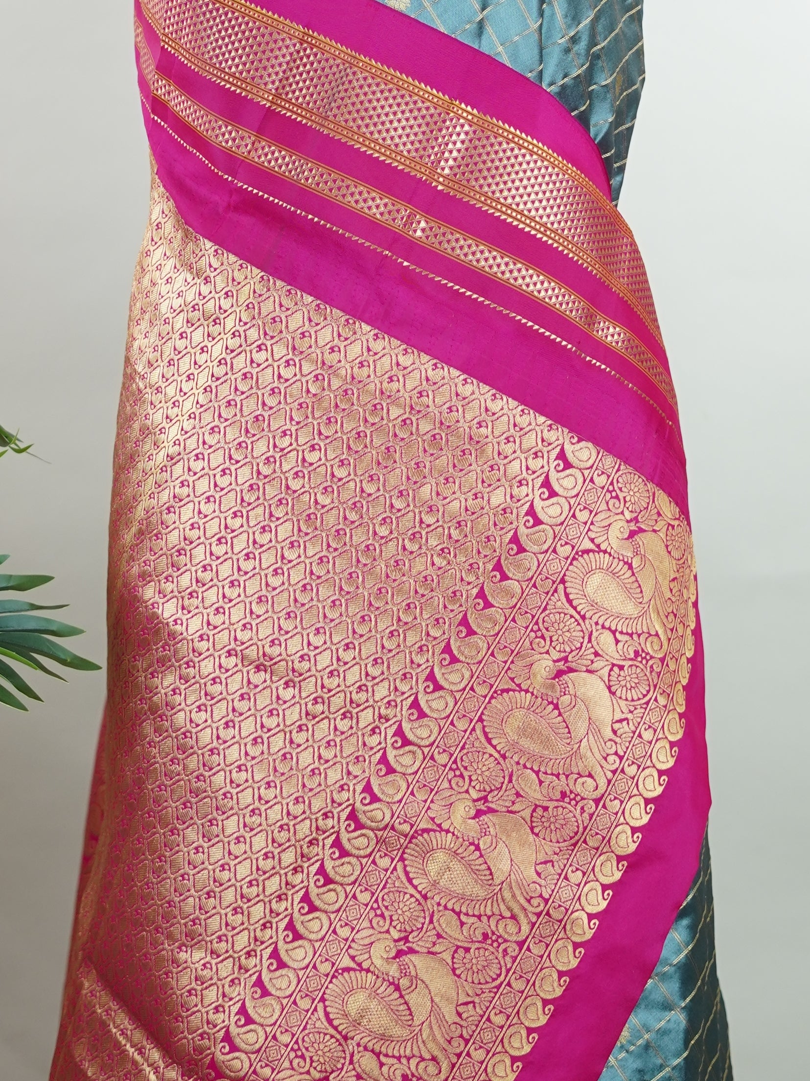 Narayanpet Narayanpet sarees with checks and buttis showcase a perfect blend of tradition and simplicity, featuring intricate motifs woven over classic check patterns.
Their vibrant colors and fine craftsmanship make them elegant choices for any occasion.
 Chamundi - Manoranjitham Weaves - Handloom Store