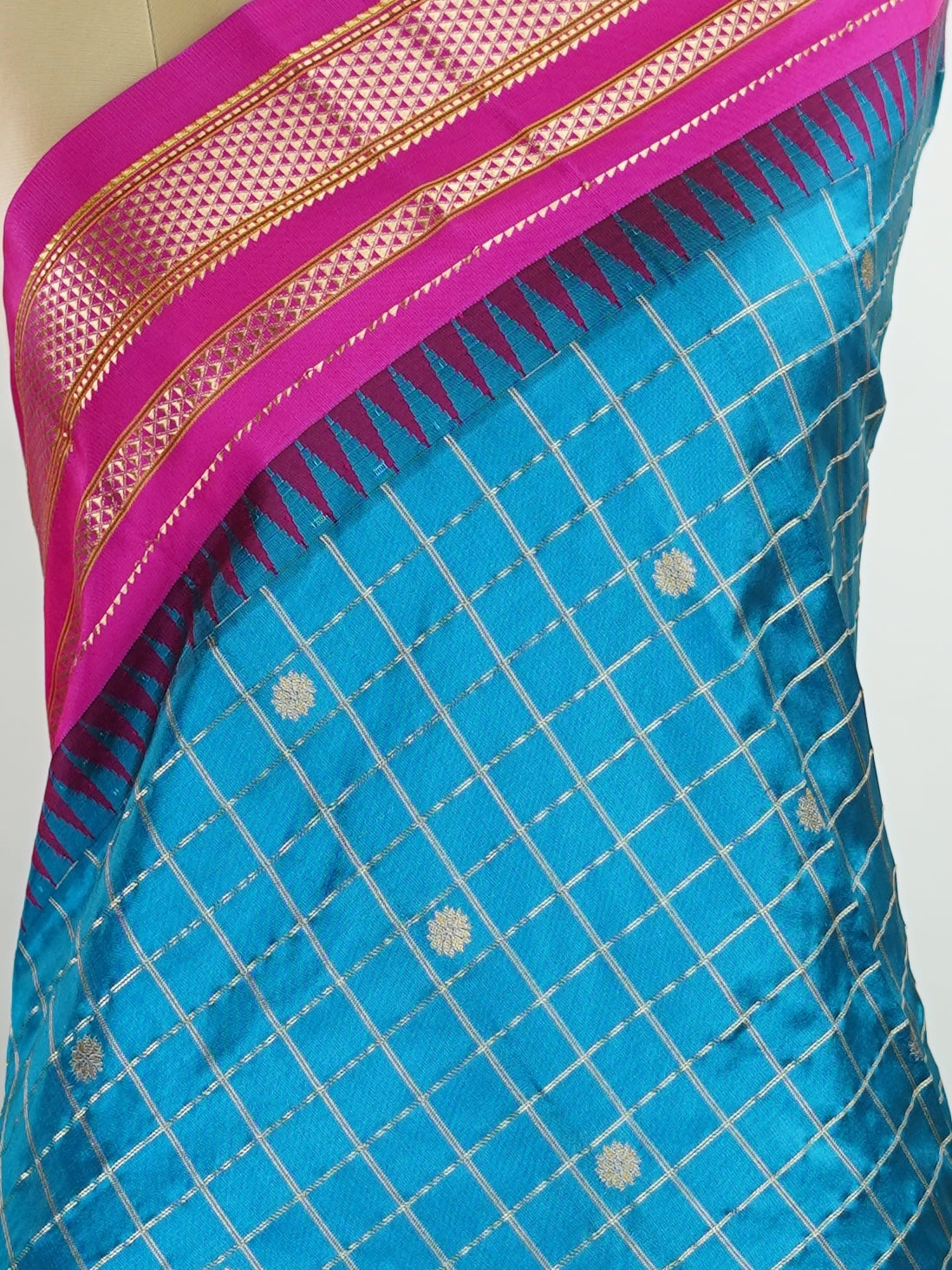 Narayanpet Narayanpet sarees with checks and buttis showcase a perfect blend of tradition and simplicity, featuring intricate motifs woven over classic check patterns.
Their vibrant colors and fine craftsmanship make them elegant choices for any occasion.
 Parvati - Manoranjitham Weaves - Handloom Store